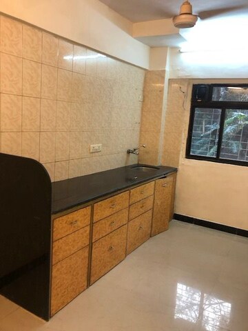 Kitchen in 2 BHK Apartment at Seven Bunglow – for Sale