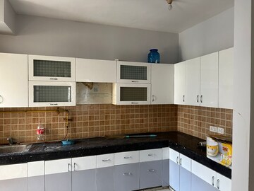 Kitchen in 2.5 BHK Apartment at Mahagun Mywoods II, Sector 16c Greater Noida – for Sale