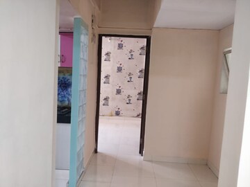 Building Lobby in 1 BHK Apartment at Jai Matadi Complex, Kalher – for Sale