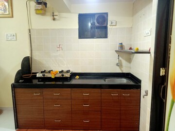 Kitchen in 1 RK Apartment at Soham Parijat Gardens, Ghodbunder Road – for Sale