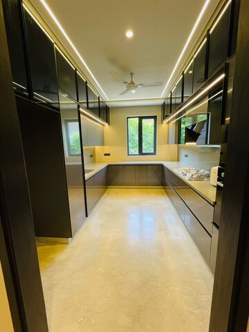 Kitchen in 4 BHK Builder Floor at Ansal Sushant Residency, Sushant Lok Iii – for Sale