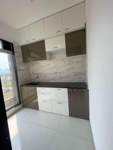 Kitchen in 1 BHK Apartment at Agarwal And Doshi Complex, Vasai West – for Sale