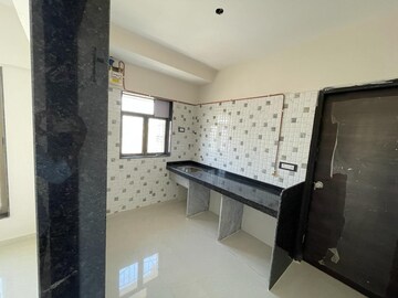 Kitchen in 1 BHK Apartment at Harshal Devchhaya, Dahisar East – for Sale