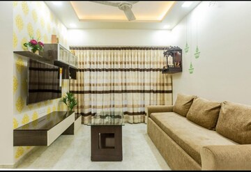Living Room in 1 BHK Apartment at Lodha Amara, Kolshet Road – for Sale