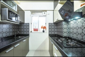 Kitchen in 1 BHK Apartment at Lodha Amara, Kolshet Road – for Sale