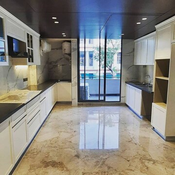 Kitchen in 3.5 BHK Apartment at Ambience Island Lagoon, Sector 24 – for Sale