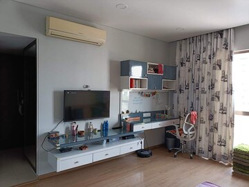 Living Room in 4 BHK Apartment at Panchshil One North, Magarpatta City – for Sale