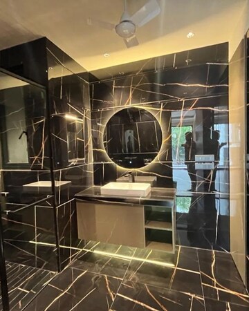 Bathroom in 5 BHK Apartment at Ambience Island Lagoon, Sector 24 – for Sale