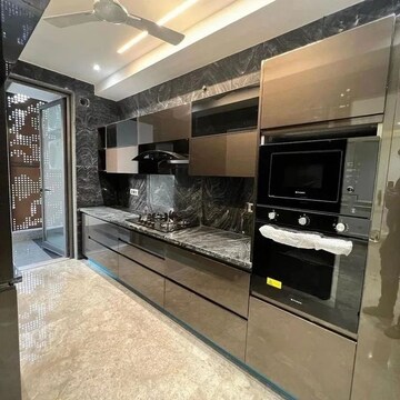 Kitchen in 5 BHK Apartment at Ambience Island Lagoon, Sector 24 – for Sale