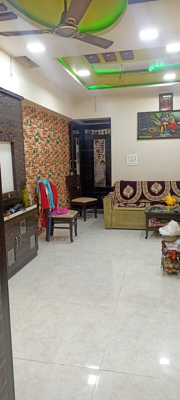 Living Room in 1 BHK Apartment at Lodha Amara, Kolshet Road – for Sale