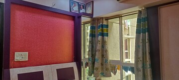 Living Room in 1 BHK Apartment at Lodha Amara, Kolshet Road – for Sale