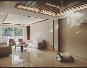 Living Room in 4 BHK Apartment at DLF The Belvedere Park, Sector 24 – for Sale