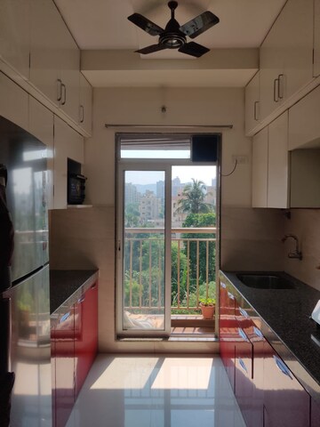 Kitchen in 1 BHK Apartment at Squarefeet Imperial Square, Ghodbunder Road – for Sale
