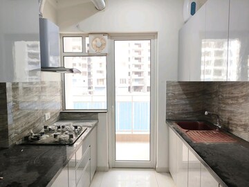 Kitchen in 3 BHK Apartment at Shapoorji Pallonji Joyville Phase 2, Sector 102 – for Sale
