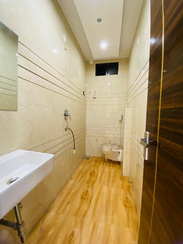 Bathroom in 4 BHK Builder Floor at Dwarka Mor – for Sale
