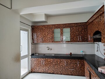 Kitchen in 2 BHK Apartment at Supertech Ecovillage II, Sector 16b Greater Noida – for Sale