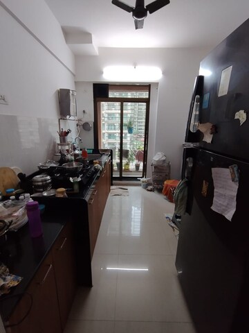 Kitchen in 2.5 BHK Apartment at Shree Satya Shankar Residency, Manpada – for Sale