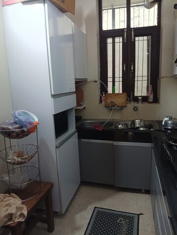 Kitchen in 2 BHK Apartment at Shri Devaji Residency, Dhakoli Village – for Sale