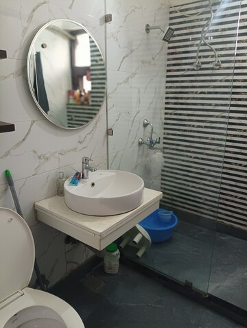Bathroom in 2 BHK Apartment at Shri Devaji Residency, Dhakoli Village – for Sale