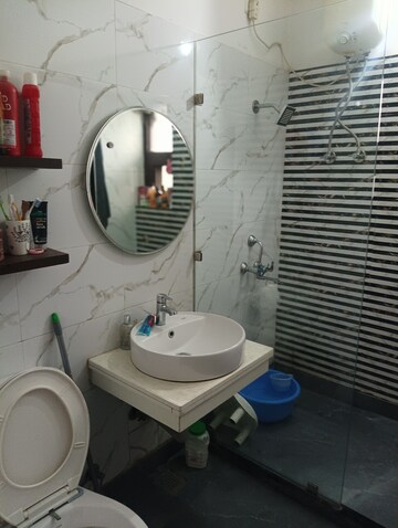 Bathroom in 2 BHK Apartment at Shri Devaji Residency, Dhakoli Village – for Sale