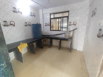 Kitchen in 2 BHK Apartment at Sainath Apartment, Virar East – for Sale