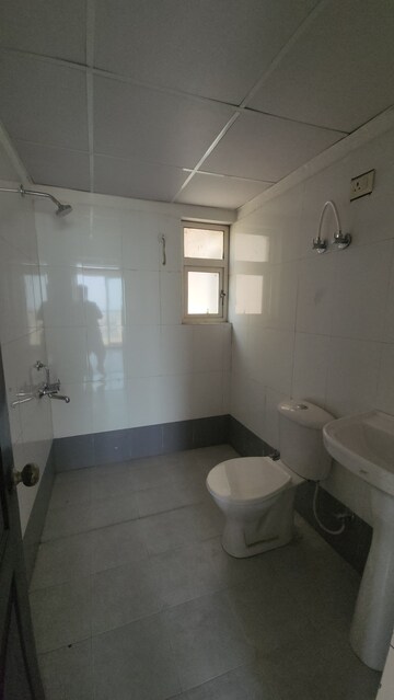 Bathroom in 2 BHK Apartment at Aditya Luxuria Estate, Dasna – for Sale