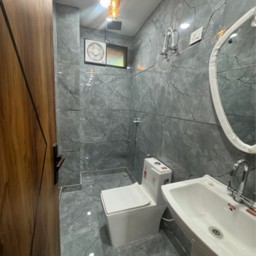 Bathroom in 3 BHK Builder Floor at Mohan Garden – for Sale