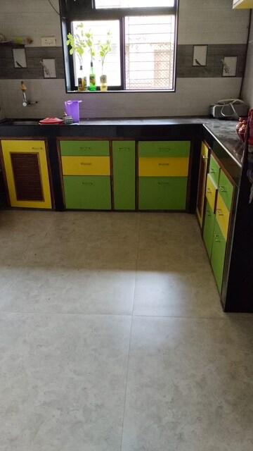 Kitchen in 2 BHK Apartment at Balkum Pada – for Sale