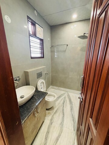 Bathroom in 2 BHK Apartment at Tulip Lemon, Sector 69 – for Sale
