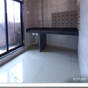 Kitchen in 2 BHK Apartment at Hiranandani Fortune City, Rasayani – for Sale