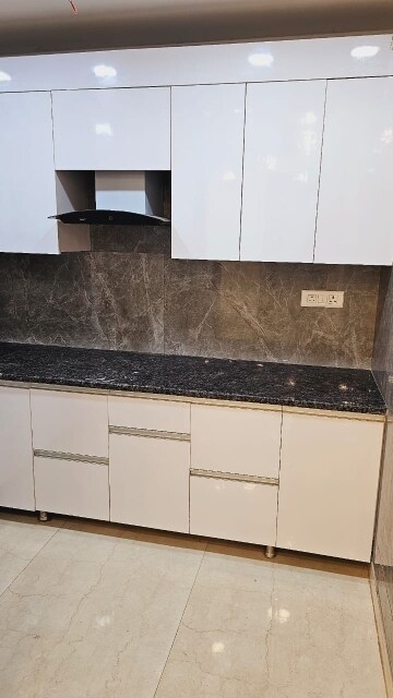 Kitchen in 3 BHK Apartment at Mahavir Enclave 1 – for Sale