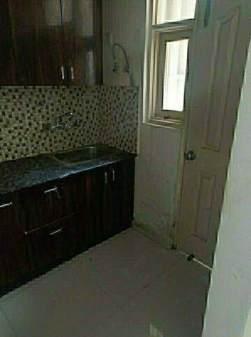 Kitchen in 2.5 BHK Apartment at Gulmohur Garden, Raj Nagar Extension – for Sale