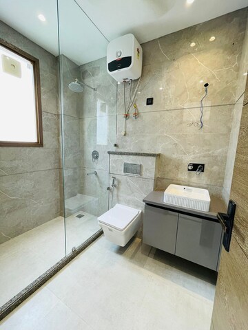 Bathroom in 4 BHK Builder Floor at Ansal API Esencia, Sector 67 – for Sale