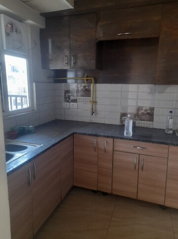 Kitchen in 3 BHK Apartment at Gaur 14th Avenue High Street, Sector 16c Greater Noida – for Sale