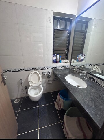 Bathroom in 2 BHK Apartment at Mangalam CHS Malad, Govind Nagar – for Sale
