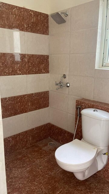 Bathroom in 2 BHK Apartment at Signature Global Orchard Avenue, Sector 93 – for Sale
