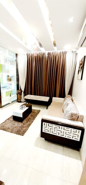Living Room in 2 BHK Apartment at Dynamic Crest, Shilphata – for Sale