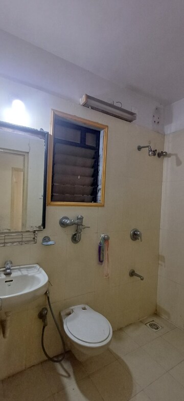 Bathroom in 2 BHK Apartment at Raunak Laxmi Narayan Residency, Pokhran Road No 2 – for Sale