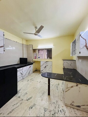 Kitchen in 2 BHK Apartment at Manikchand Malabar, Lulla Nagar – for Sale
