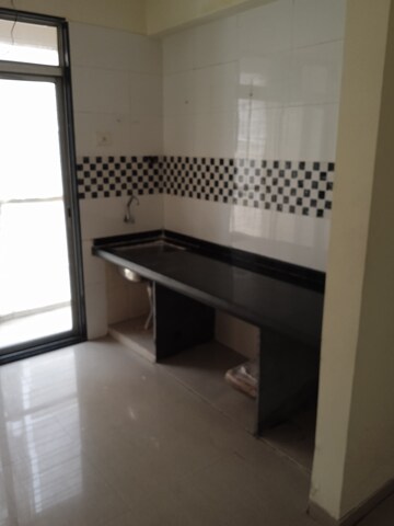 Kitchen in 1 BHK Apartment at Platinum Aura, Roadpali – for Sale