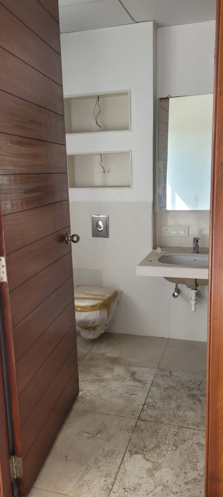 Bathroom, marvel-sangria 4 Bedroom 4800 Sq.Ft. Apartment In Mohammadwadi Pune 7311596