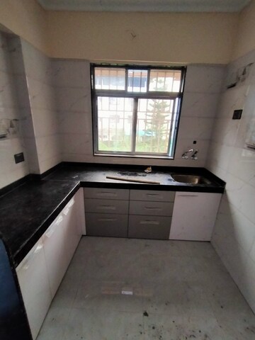 Kitchen in 1 BHK Apartment at Golden Chawre Wadi, Virar West – for Sale