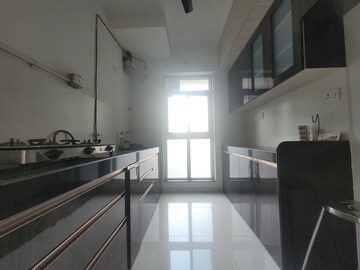 Kitchen in 1.5 BHK Apartment at Godrej Emerald, Ghodbunder Road – for Sale