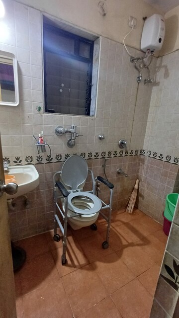 Bathroom in 2 BHK Apartment at Raunak Laxmi Narayan Residency, Pokhran Road No 2 – for Sale