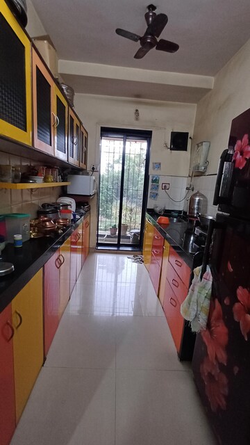 Kitchen in 2 BHK Apartment at Raunak Laxmi Narayan Residency, Pokhran Road No 2 – for Sale