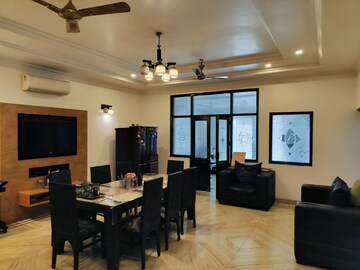 Living Room in 2 BHK Apartment at Amrapali Golf Homes, Sector 4 Greater Noida – for Sale