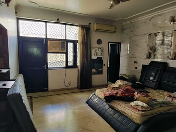 Living Room in 2 BHK Apartment at Amrapali Golf Homes, Sector 4 Greater Noida – for Sale