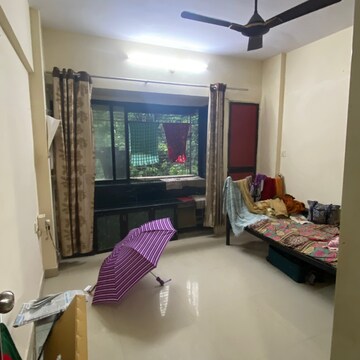 Living Room in 2 BHK Apartment at Yogi Hills, Ghati Pada – for Sale