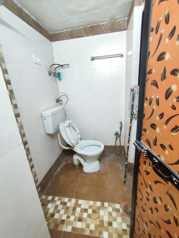 Bathroom in 1 BHK Apartment at Krishna Greenland Park Vastu Federation, Ghodbunder Road – for Sale