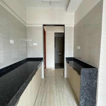 Building Lobby in 2 BHK Apartment at Je And Vee Om Trimurti, Dindoshi – for Sale